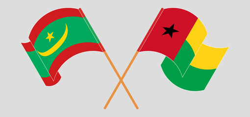 Wall Mural - Crossed and waving flags of Mauritania and Guinea-Bissau