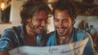 © nicole - Happy gay couple discussing house blueprints indoors, envisioning their future home together. The photo captures their joy and collaborative spirit as they plan their living space.