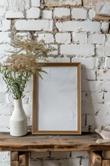 Wall Mural - A picture frame on a wooden table, perfect for home decor