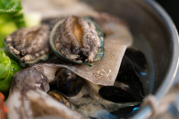 Wall Mural - View of the abalone in the seafood stew