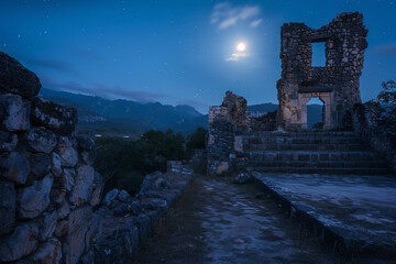 Sticker - Mystical Moonlight Over Ancient Ruins on a Haunting Night  