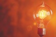 © millionaire - Glowing light bulb on orange background. Generative Ai