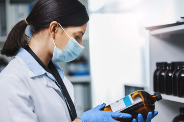 Canvas Print - Scientist, woman and product for hygiene in hospital for biotechnology research, experiment and safety with chemicals. Assistant, glass and liquid for test solution, equipment or chemist of health