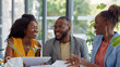 © mattegg - Sleek Office Meeting with Insurance Agent – Couple discusses insurance plans in professional setting