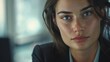 © Nawarit - Young businesswoman in a sleek office setting, confidently leading a meeting with a professional demeanor, highresolution