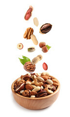 Sticker - Different nuts falling into bowl on white background