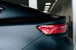 © Hanna - Modern rear light on new matte black automobile