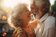 © vefimov - A couple of older people are hugging and smiling. The woman is wearing a yellow dress and the man is wearing a white shirt. Scene is happy and loving