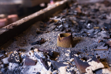 Wall Mural - Remains of knocked out casting molds in the workshop of metallurgical plant