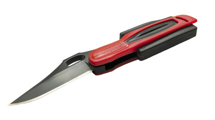 A red and black knife with a black handle laid on a flat surface