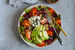 © Pietro Karras/Stocksy - Fresh Bowl of Avocado and Tomato Salad