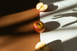 © Painted Wood/Stocksy - Apples with a hand shadow grabbing