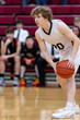 © Melanie DeFazio/Stocksy - JV boys basketball game.