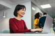 © VICTOR TORRES/Stocksy - Professional woman working at her desk in office