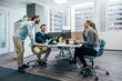 © VICTOR TORRES/Stocksy - Collaborative team meeting in a modern office space