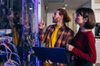 © VICTOR TORRES/Stocksy - Explaining technical details in a server room