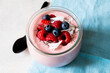 © Nadine Greeff/Stocksy - Berry fruit parfait dessert