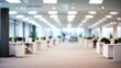 © Uzair - Blurred empty open space office. Abstract light bokeh at office interior background for design