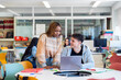 © Santi Nuñez/Stocksy - Learning Together in a high school