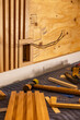 © Raymond Forbes LLC/Stocksy - Construction of Vertical wood wall with electrical wires