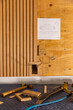 © Raymond Forbes LLC/Stocksy - Background of  Construction of Vertical wood paneling wall