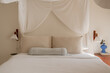 © Minette Hand/Stocksy - Minimal Bedroom with Details