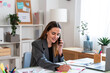 © nomad studio/Stocksy - Business Communication on Phone