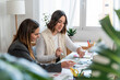 © nomad studio/Stocksy - Businesswomen Analyzing Documents Together