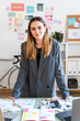 © nomad studio/Stocksy - Businesswoman Preparing Marketing Materials