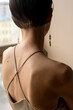 © Amor Burakova/Stocksy - Back of a woman with short haircut