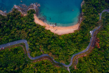 Wall Mural - Aerial top view Phuket, sand beach of paradise sea and winding road, sunset time. Concept tropical travel photo of Thailand