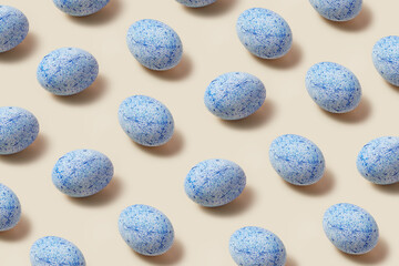 Blue and white spotted hen eggs placed chaotically