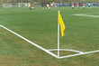 © Rene de Haan/Stocksy - yellow flag at corner of soccer field
