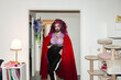 © Luis Velasco/Stocksy - Portrait Of A Drag Queen Artist At Home.