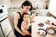 © Olga Murzaeva/Stocksy - mother and child have breakfast in the kitchen
