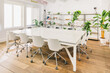 © VICTOR TORRES/Stocksy - Modern office meeting room with natural light