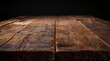 © Cetin - Wooden table with dark background
