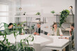 © VICTOR TORRES/Stocksy - Modern office business team engaged in a casual meeting