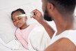 © peopleimages.com - Black family, thermometer and hand of parent with sick child in home bedroom with allergy, fever or virus. Care, kid and check temperature in bed with medical health test for bacteria, flu or problem