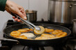 © VICTOR TORRES/Stocksy - Handcrafting Georgian cuisine - Mchadi corn bread in skillet.