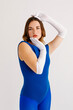 © Tania Cervian/Stocksy - Attractive woman wearing long white gloves