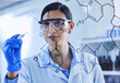 © peopleimages.com - Board, woman and scientist drawing molecule for chemistry, research development or medical analysis for solution innovation in lab. Glass, science and writing formula idea to study structure of atom