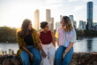 © Pedro Merino/Stocksy - Portrait of a group of friends in Brisbane at sunset