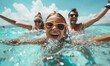 © anatoliycherkas - Happy little girl in sunglasses swimming in the sea with her parents in the background, summer vacation