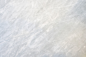 icy background on rink reveals visible traces of skating, capturing the essence of winter sport. tex