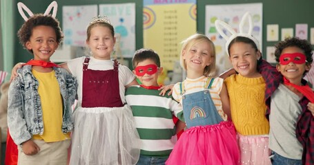 Wall Mural - Happy kids, friends and hug with costume in class for dress up or casual day at school together. Portrait of young group with smile for halloween in cosplay outfit, hero or fairy tale in classroom