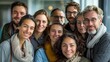 © Ben - Lifestyle portrait of diverse young people smiling warmly in a cozy conference room, showcasing various cultures. Natural and positive private meeting with a close, intimate composition