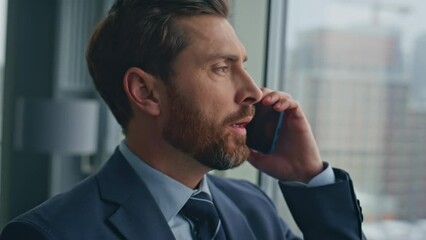 Poster - Closeup serious man calling smartphone at panoramic window. Executive talking