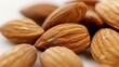 © we3_food - Close up of organic almond nuts isolated on white background. Generative Ai