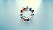 © Jay Koppelman - A group of diverse business professionals engaged in a roundtable discussion